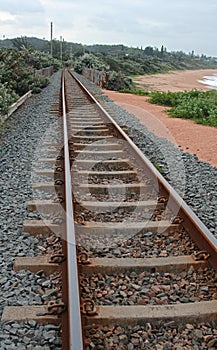 Railway line running along the coast.