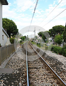Railway line with the tracks in the city
