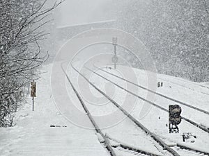 Railway line in winter in heavy snow