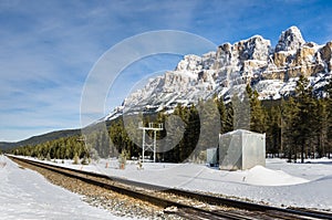 Railway Line in a Winter Mountain Landscape and Blue Sky