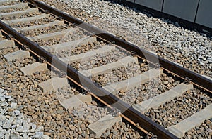 Railway Lines Closeup, Train Tracks with Track Ballast Stones, Metal Rails, Old Railway Track