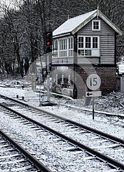 Railway lines and signal box in the snow