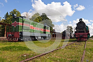 Railway Museum in the town of Haapsalu. In the foreground is the old locomotive and the train station. Scene