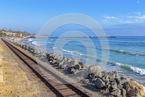 Railway near the rocks as seawall from the ocean waves at San Clemente, California