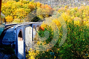 Railway Oravita-Anina in Banat-viaduct. Typical landscape in the forests of Transylvania, Romania. Autumn view.