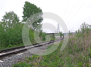 Railway rails bend for freight train road