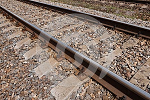 Railway rails close view - abstract background, freight transportation concept