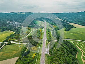 Railway rails for high-speed passenger trains amid farmland in southern France