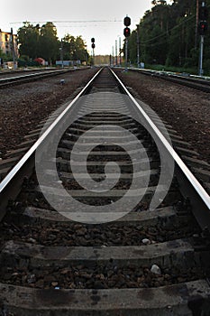 Railway with red traffic light