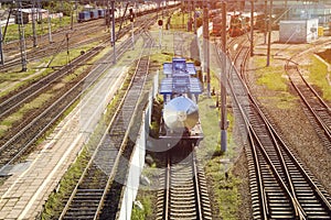 Railway: roads, poles, traffic lights, trains, locomotives. Russia