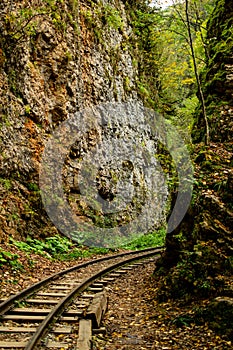 The railway runs through the rocks and mountains