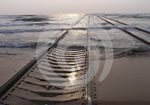 Railway in the sea photo