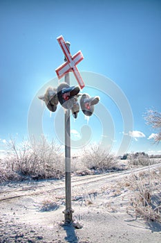 Railway sign frozen over