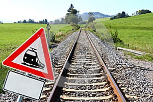 Railway sign and railway tracks