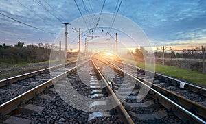 Railway station against beautiful sunny sky. Industrial landscape