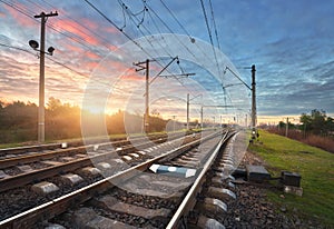 Railway station against beautiful sunny sky. Industrial landscape