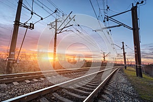 Railway station against beautiful sunny sky. Industrial landscape