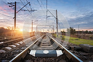 Railway station against beautiful sunny sky. Industrial landscape