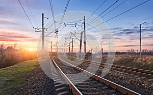 Railway station against beautiful sunny sky. Industrial landscape