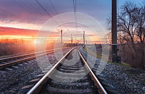 Railway station against beautiful sunny sky. Industrial landscape