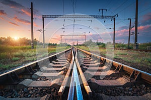 Railway station and beautiful sky at sunset. Railroad in summer