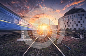 Railway station with blurred modern passenger train