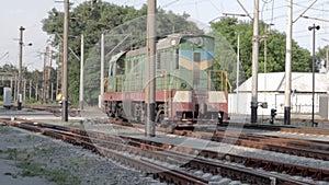 Railway station and railway station. Goods old freight train arrived at the railway station. A heavy diesel freight train passes a