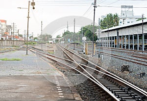 Railway station tracks common way before come to station