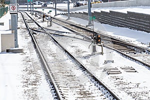 Railway switches covered in snow on a cold winter morning