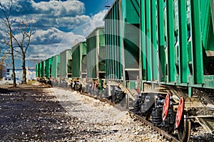 Railway tank cars with oil go on rails