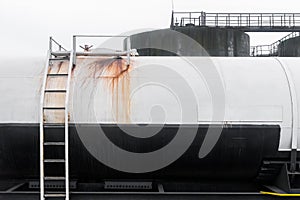 Railway tank with stains of fertilizer or industrial chemical products after unloading and storage at the plant