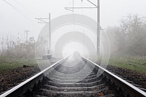 Railway track on fog