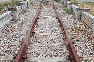 Railway track on gravel with concrete rail ties