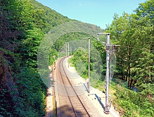 Railway track in green nature in the Ardennes of Luxembourg