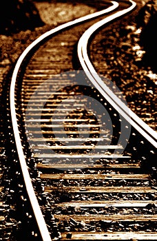 Railway track snaking into distance