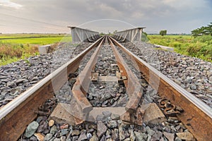 Railway track on steel truss bridge