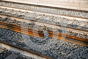 Railway tracks, empty tracks on a stretch of railway, a construction site with replaced steel beams, Rome, Italy 02 July 2023.