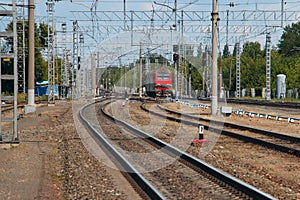 Railway tracks going away, railway power supply, electric locomotive on the tracks