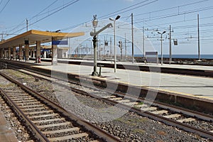 Railway tracks and passenger platform. Catania, Sicily, Italy