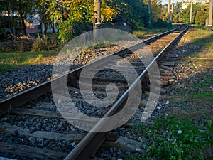 Railway tracks. Rails going around the corner. road concept