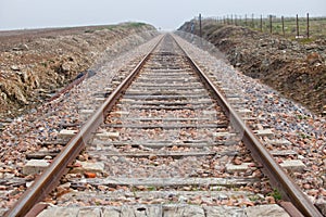 Railway tracks in a rural scene