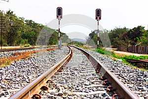 Railway tracks with signals on background