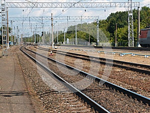 Railway tracks stretching into the distance, power to the Railways