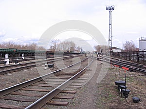 Railway tracks for the train in the industrial zone of the city industrial construction