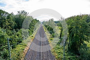 Railway tracks, train tracks, ribbon rails, straight strch for suburban railway in Germany