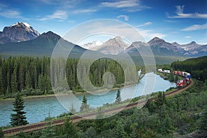 Railway with train in Banff National Park, Canada