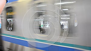 Railway train running after receive people from Nippori station