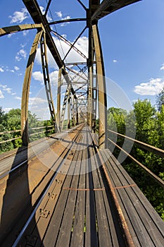 Railway viaduct in the UWA wide-angle lens on a sunny day. Summer