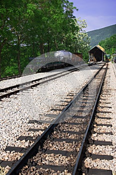 Railway, wagon and locomotive in station