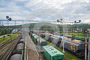 Railway wagons with gravel parked on sidings. Freight Cars Deliver Construction and bulk Materials such as stone, sand